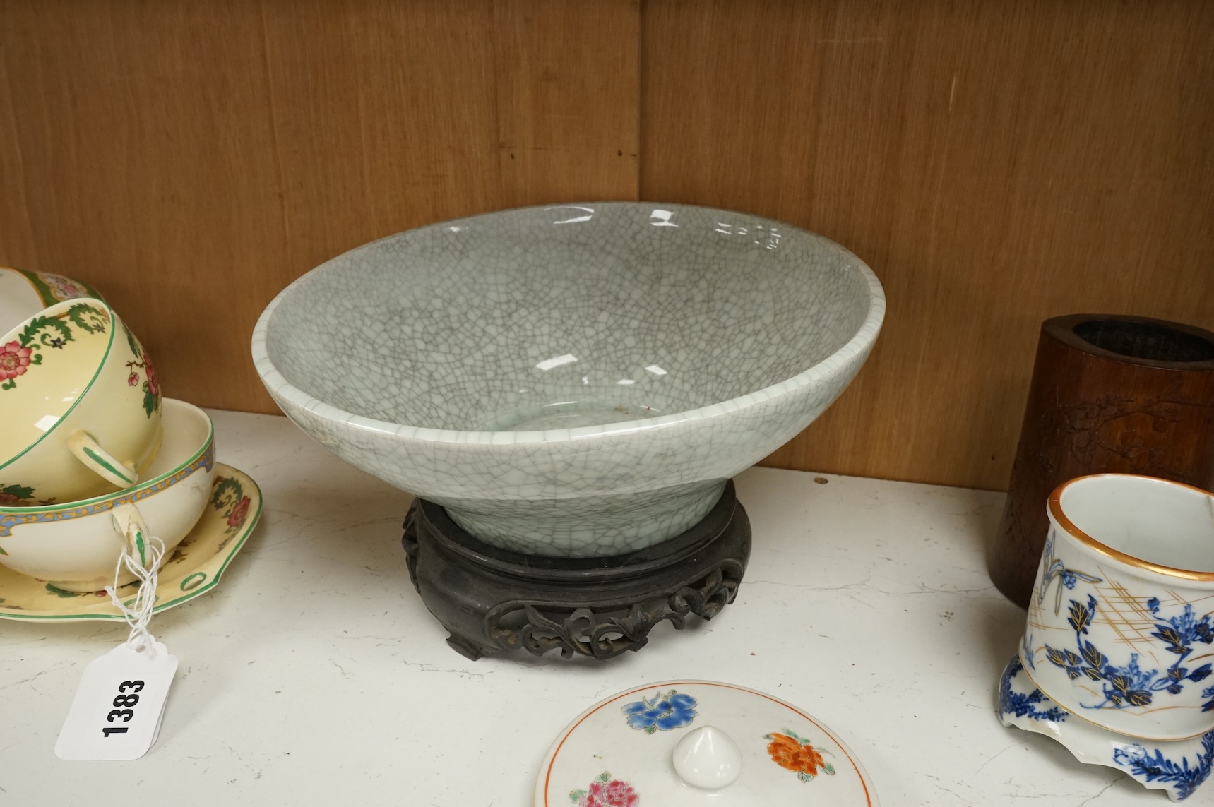 Oriental items to include a crackleglaze bowl on stand and a bamboo brush pot, together with two other vessels, largest 27cm in diameter